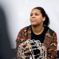 Girls of Color Summit previous event a participant holding a ball during a game